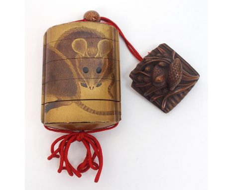 A Japanese four case gold lacquered inro decorated with two rats, with floral ojime bead and finely carved wood netsuke in th