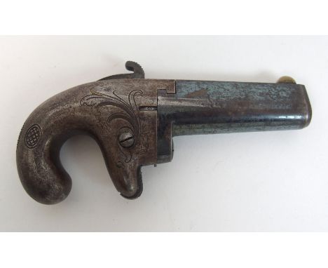 A Colt .41 calibre rim-fire First Model Derringer circa 1870, the 2 1/2" (6.5cm) barrel stamped Colt's PT F.A. MFG Co., Hartf