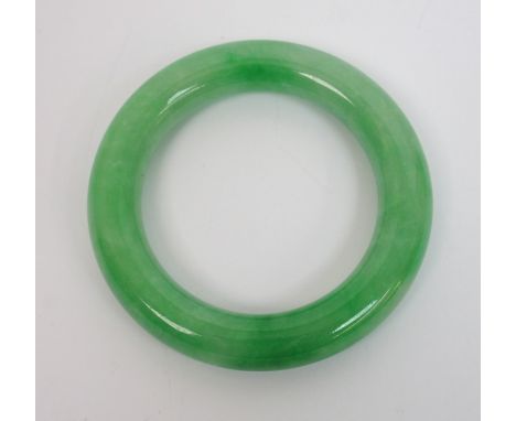 A Chinese hardstone bangle 8cm diameter