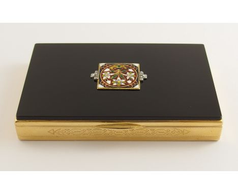 An Art Deco CARTIER 18ct gold, onyx, enamel and diamond boxsigned Cartier Paris, Londres, New York and numbered. The box lid 