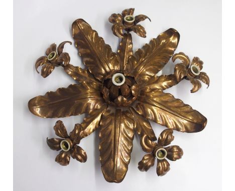An Arts and Crafts copper ceiling light the electric ceiling light of radiating leaf form with five bulb arms and one central