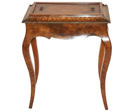 A Victorian walnut planter the cover inlaid with a vase of flowers and surrounded by flowers enclosing tin liner above scroll