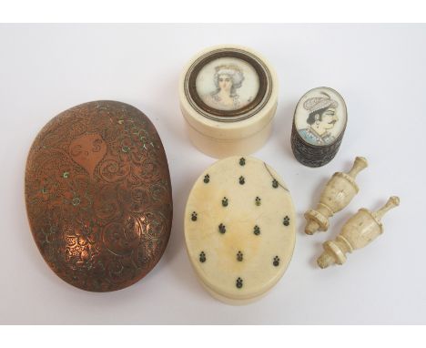 A copper snuff box with chased foliate decoration 8cm long, an ivory screw top patch box, the lid with painted profile of a 1