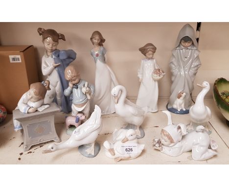 11 pieces of Nao pottery including Girl Sleeping at Desk, Small boy on phone, Girl putting on dressing gown, 3 geese figures 