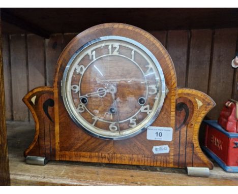 A 1920s/1930s inlaid walnut chiming mantle clock. 