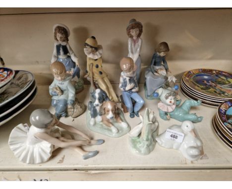 11 Nao figurines 