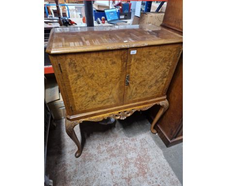 A vintage walnut cocktail/drinks cabinet. 