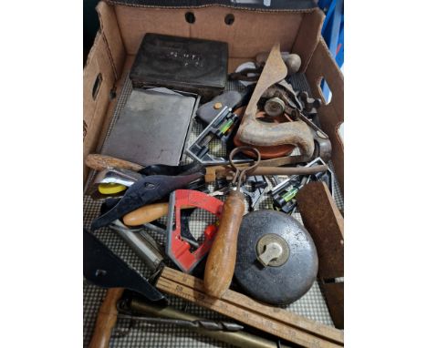 A box of vintage tools. 