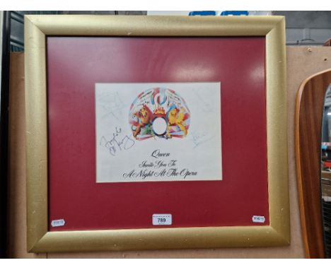 A framed Queen programme, signed by all the members of the band, ticket from Preston Guild Hall contained with the frame wher
