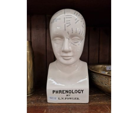 A ceramic Phrenology head by L.N.Fowler, 25cm height.