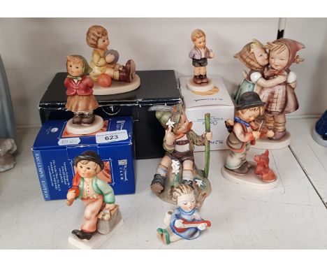 8 Hummel figurines including an early, large double figurine c. 1950 ‘Telling Her Secret’, ‘Mountaineer’ 1964-72, 3 boxed fig