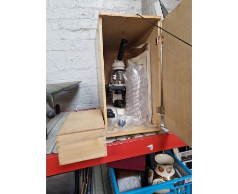 A Brunel microscope with case and accessories. 