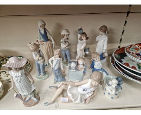 11 Nao figurines 