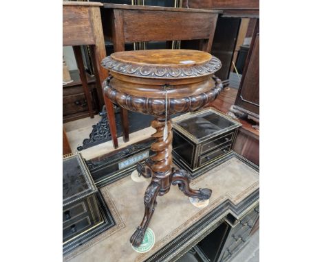 A mid 19th century marquetry inlaid walnut tea poy, with fitted interior, cut glass mixing bowls and rosewood caddies, twist 