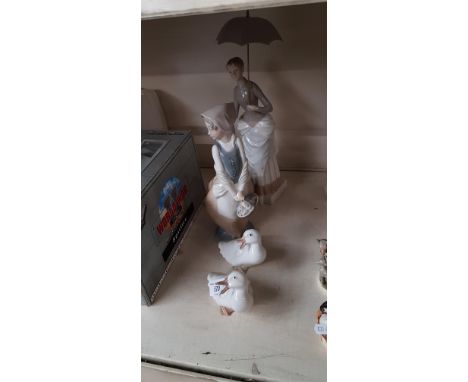 Nao - a large vintage figurine of a woman with a parasol approx 34cm high together with a figure of a girl carrying a basket 