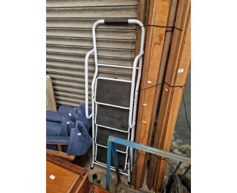 A set of metal step ladders 