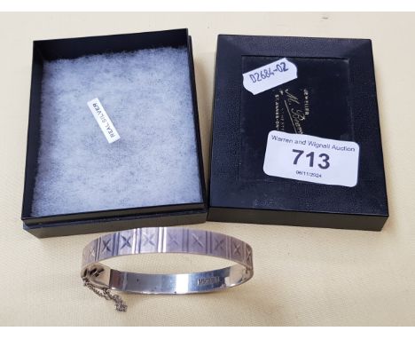 A hallmarked silver bangle. 