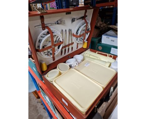 A cased Brexton picnic set including Fiesta crockery &amp; a wooden folding cake stand. Appears almost complete - possibly 2 