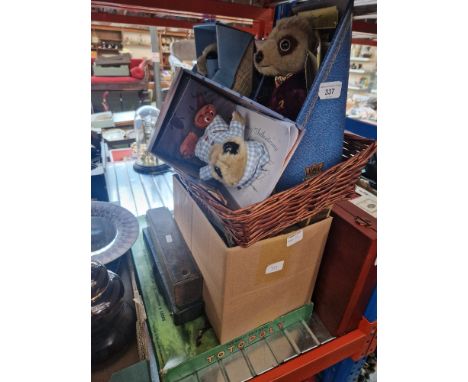 A box stamp albums, 2 sets of dominoes, boxed Totoploy game and a basket containing meerket toys