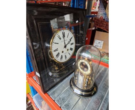 A wall clock in glazed wooden box frame by F L Hausburg, A Paris, together with a mantel clock under glass dome.