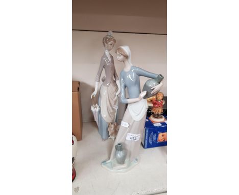 Lladro - 2 vintage figurines ‘Lady of the Boulevard’ 36cm high (no. 4761) and ‘Water Carrier’ (no.4875) 32.5cm high 
