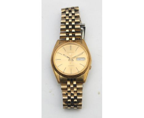 Seiko 5, a gold plated automatic day date gentleman's wristwatch, ref. 7S26-3110, original bracelet