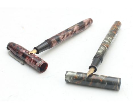 Conway Stewart 75, a pink mottle barrel , 14ct gold nib fountain pen and a Watermans brown/silver mottled barrel, 14k gold ni