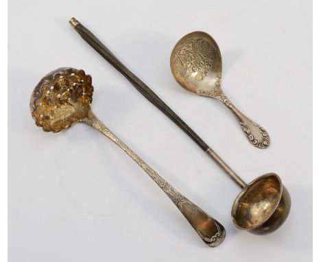 A Scottish silver sifter ladle, Edinburgh 1833, together with a silver embossed caddy spoon, Birmingham 1899, and a silver to