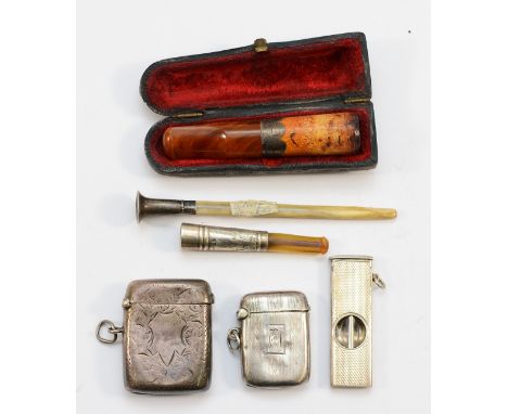 Two silver vesta cases, Chester 1899, Birmingham 1926, together with a silver cigar cutter, Birmingham 1979, a silver collare