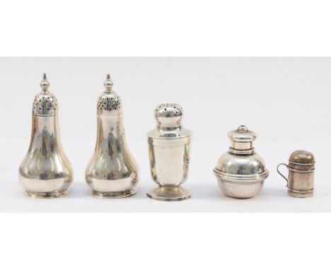 A pair of silver salt and pepper shakers, Sheffield 1917, together with three other shakers, Birmingham 1897, Chester 1917, C