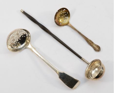 Two silver sifter ladles, Sheffield 1912, London 1883, together with silver toddy ladle, Birmingham 1857, having whale bone h