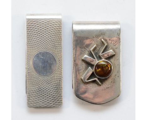 A silver money clip Birmingham 1989, together with a sterling silver money clip with gem decoration to the front, 39gm.