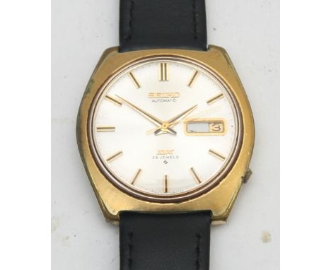 Seiko DX, a gold plated automatic day date gentleman's wristwatch, ref. 6106-8080, leather strap.