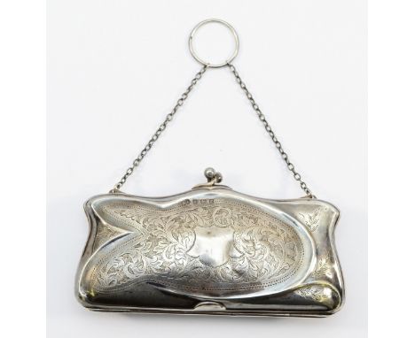 A silver purse, Birmingham 1916, with fitted interior, 87gm, having dents to the silver both front and back.
