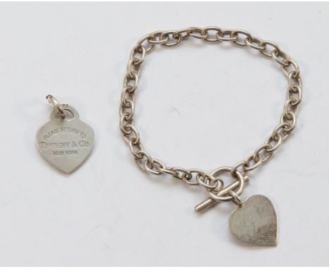 Tiffany &amp; Co, a 925 silver heart charm, with a 925 silver bracelet with a heart charm, 20cm, 23g