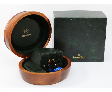 Audemars Piguet, Millenary, an oval mahogany watch winder  box, size C battery operated, with space for two watches, 27 x 23 