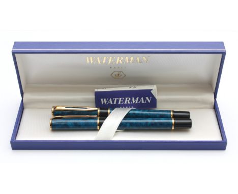Waterman, a mottled blue fountain pen and rollerball set, apparently unused, 1995 guarantee, case