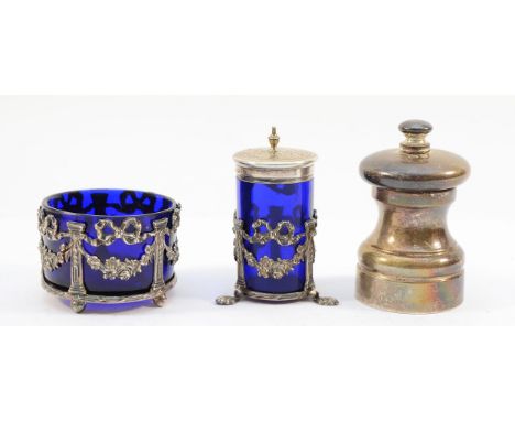 A silver open salt with blue glass liner, Birmingham 1902, together with a silver and blue glass pepper shaker, Chester 1902,