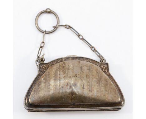 A silver purse, Birmingham 1919, with fitted interior, 10x6cm, having dents to the silver both front and back, 66gm.