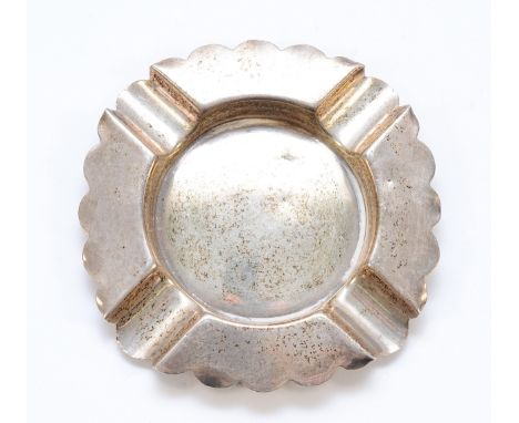 A silver ashtray, London 1896, having scallop edge, 9cm, 43gm.