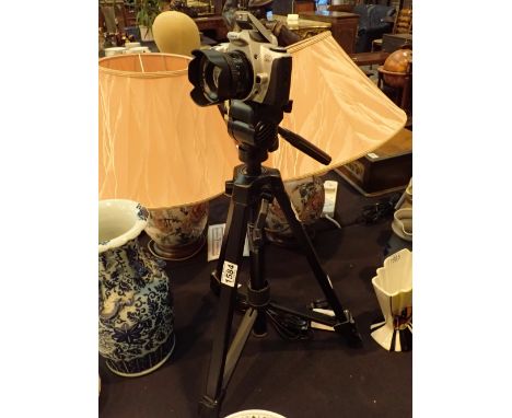 Canon EOS camera lamp on heavy duty tripod and power supply with switch