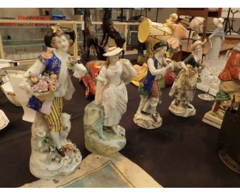 Four Continental ceramic figurines tallest H: 27 cm