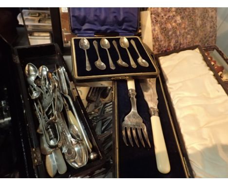 Shelf of mixed cutlery