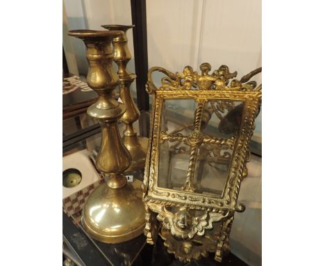 Brass hanging lamp and a pair of brass candlesticks with pushers