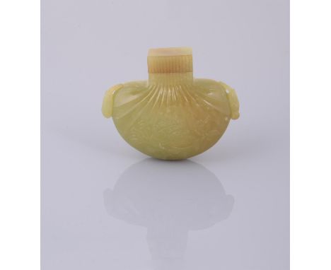 A Chinese yellow jade purse-form pomander, of flattened semi-circular form, each naturalistically carved in shallow relief wi