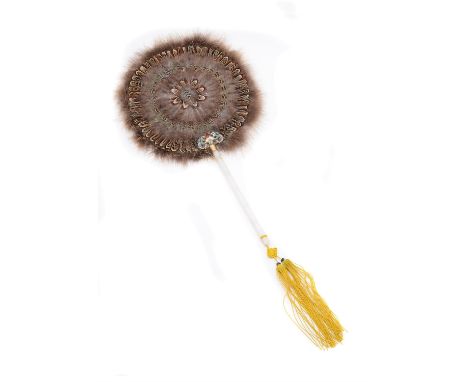 A Chinese circular pheasant feather fan, the handle made with white jade, 42cm long白玉柄锦鸡羽团扇Condition Report: GoodCondition Re