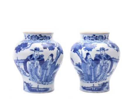 A pair of Chinese blue and white vases, Qing Dynasty, 19th century, in Kangxi style, painted with scholars in landscapes, one