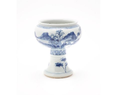 A Chine blue and white stem cup, the compressed globular body decorated with a continuous landscape scene, 14.5cm high 青花山水图高