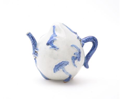 An unusual Chinese blue and white 'Cadogan' teapot, 18 or 19th century, in Ko-sometsuke style, moulded with with auspicious b