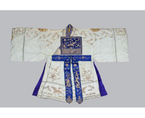 A Chinese white 2nd degree Taoist priests robe, circa 1900, embroidered in gold thread with a yellow lining, with Taoist symb